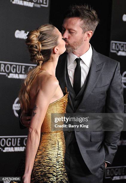 Actress Jaime King and Kyle Newman attend the premiere of Walt Disney Pictures and Lucasfilms' 'Rogue One: A Star Wars Story' at the Pantages Theatre...