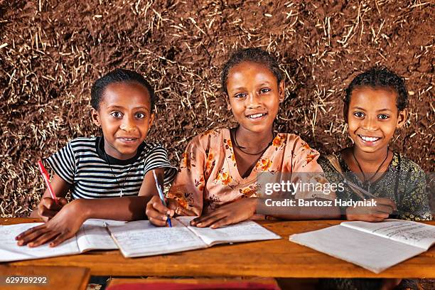 african little girls are learning amharic language - seven point stock pictures, royalty-free photos & images