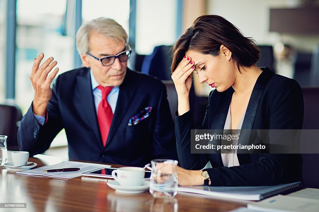 Businessman is insulting his secretary