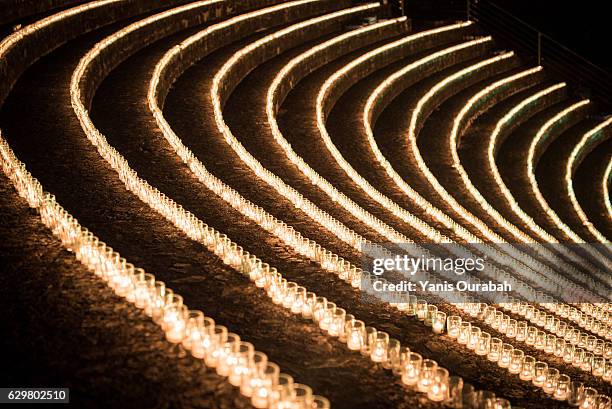 the odeon of the fourviere archeological site at night during the lyon festival of lights in december 2016 in france - bougie ストックフォトと画像