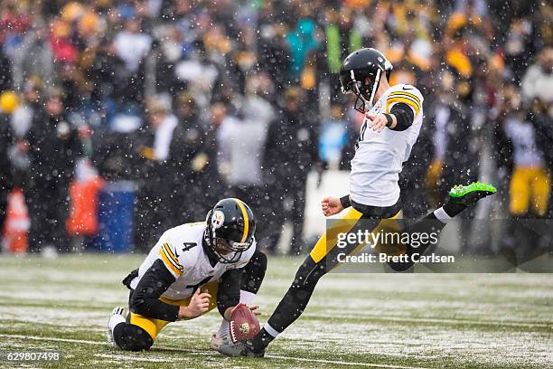 Jordan Berry holds as Chris Boswell of the Pittsburgh Steelers attempts a field goal during the game against the Buffalo Bills on December 11, 2016...