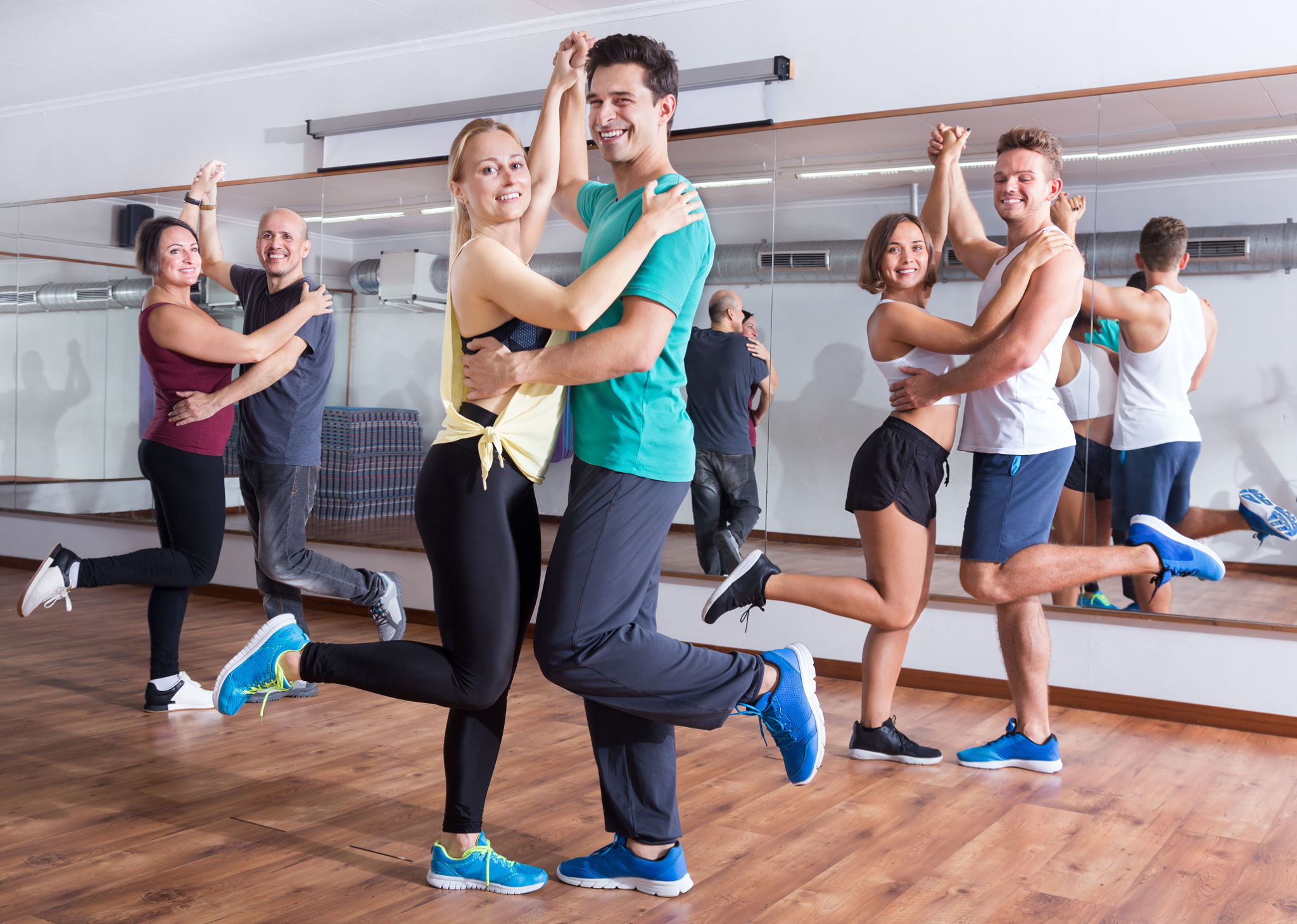 Men and women dancing salsa o bachata Men and women dancing salsa o bachata