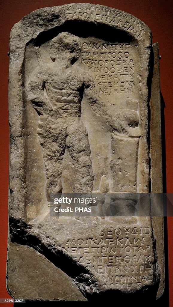 Tombstone relief with a Murmillo Gladiator and Greek Verses. Roman. 2nd century AD.