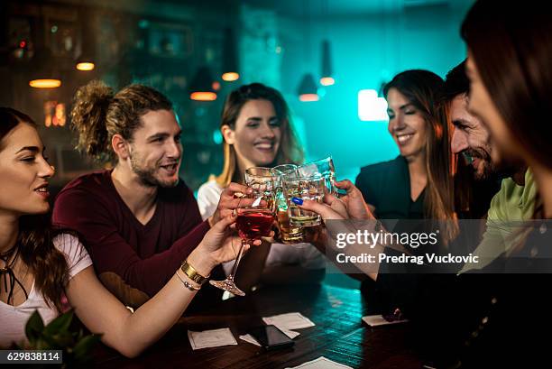 group of people in the bar - elegant cocktail party stockfoto's en -beelden