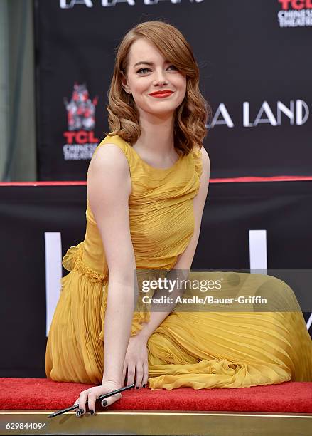 Actress Emma Stone attends the ceremony honoring her and Ryan Gosling with Hand and Footprint Ceremony on behalf of Lionsgate's La La Land at TCL...