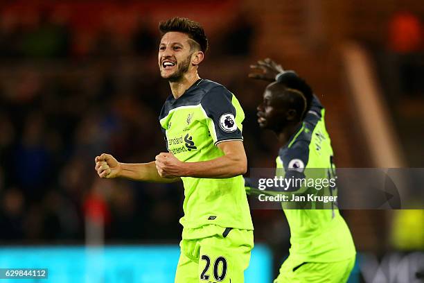 Adam Lallana of Liverpol celebrates scoring his sides first goal with Sadio Mane of Liverpool during the Premier League match between Middlesbrough...