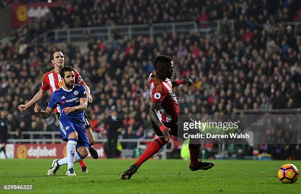 Cesc Fabregas of Chelsea scores his sides first goal during the Premier League match between Sunderland and Chelsea at Stadium of Light on December...