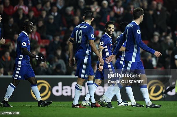 Chelsea's Spanish midfielder Cesc Fabregas celebrates scoring his team's first goal during the English Premier League football match between...