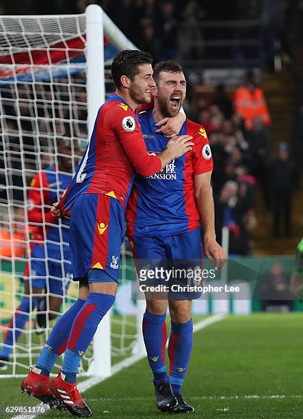 James McArthur of Crystal Palace celebrates scoring his sides first goal with Joel Ward of Crystal Palace during the Premier League match between...