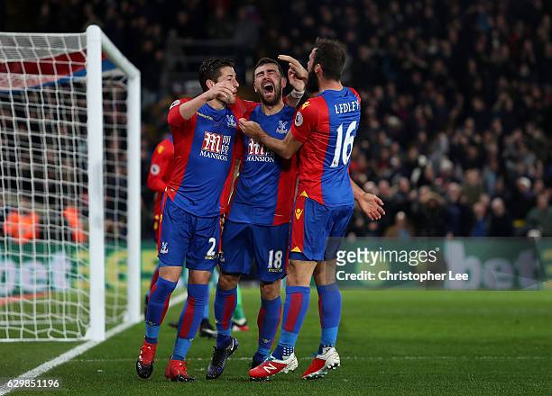 James McArthur of Crystal Palace celebrates scoring his sides first goal with Joe Ledley of Crystal Palace and Joel Ward of Crystal Palace during the...