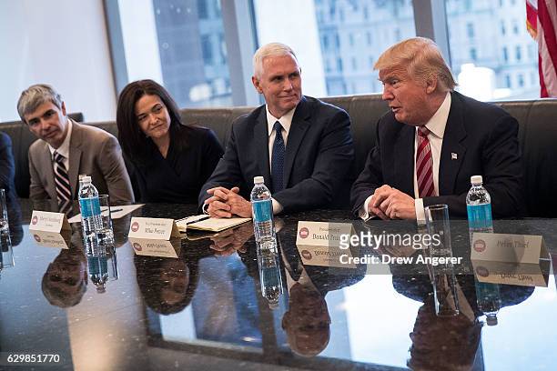 Larry Page, chief executive officer of Alphabet Inc. , Sheryl Sandberg, chief operating officer of Facebook, Vice President-elect Mike Pence listen...