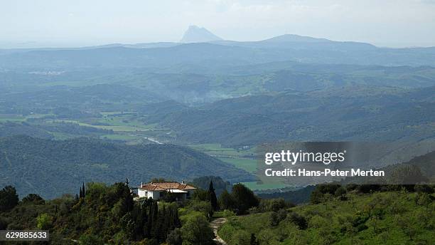 view from gaucin to rock of gibraltar - gaucín fotografías e imágenes de stock