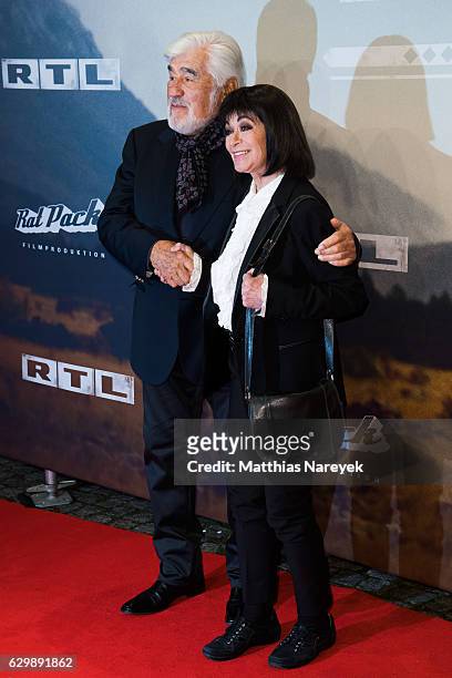Mario Adorf and Marie Versini attend the 'Winnetou - Eine neue Welt' premiere at Delphi on December 14, 2016 in Berlin, Germany.