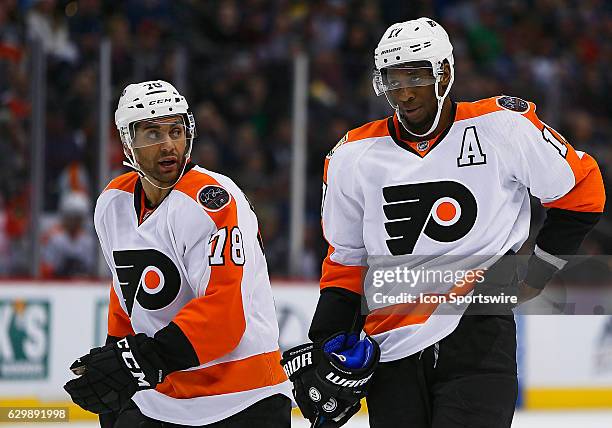 Philadelphia Flyers right wing, Pierre-Edouard Bellemare and Flyers right wing, Wayne Simmonds wait for a face-off during a regular season NHL game...