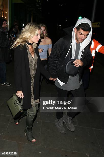 Lottie Moss and Alex Mytton leaving Embargo nightclub on December 14, 2016 in London, England.