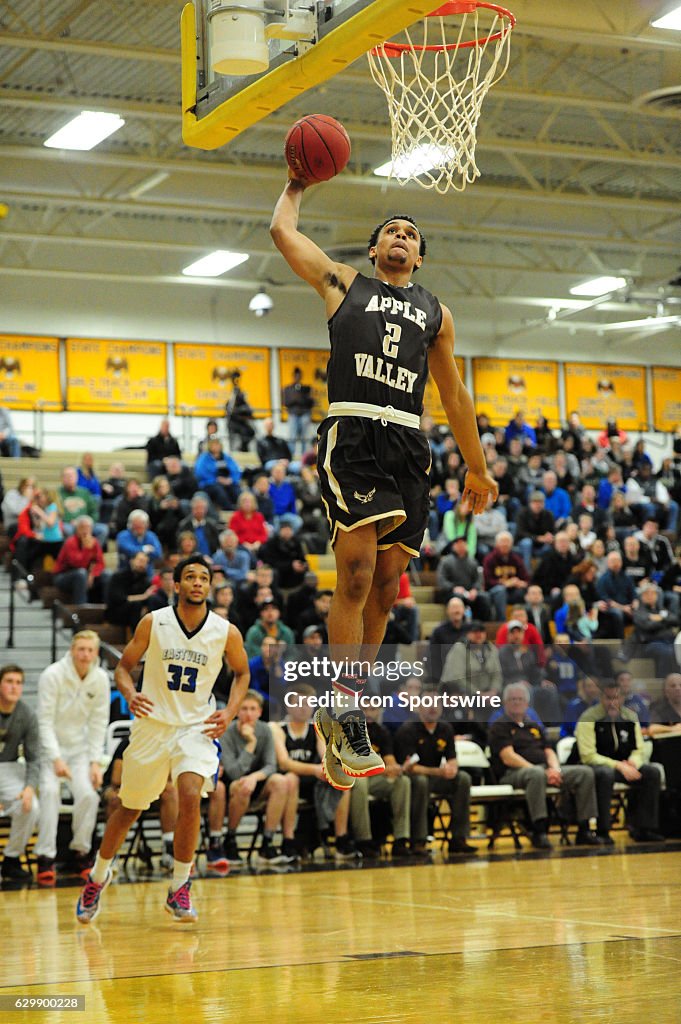 Apple Valley Eagles guard Gary Trent Jr. dunks against the Eastview