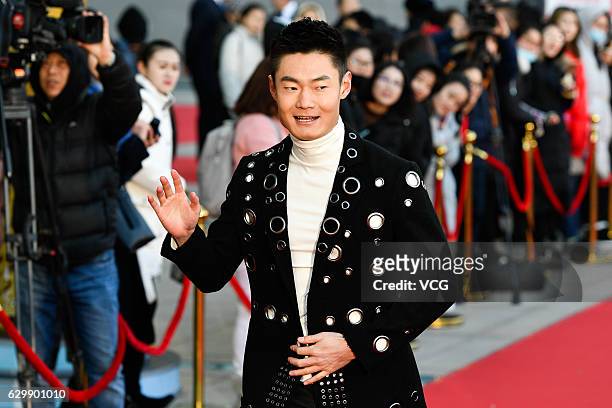 Sprinter Zhang Peimeng arrives at the red carpet of 2016 China Top Ten Benefitting Laureus Sport For Good awards ceremony on December 15, 2016 in...