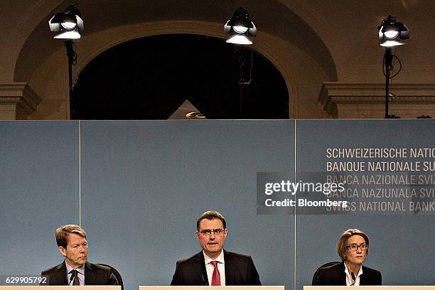 Fritz Zurbrugg, member of the governing board of the Swiss National Bank , left, Thomas Jordan, president of the Swiss National Bank , and Andrea...