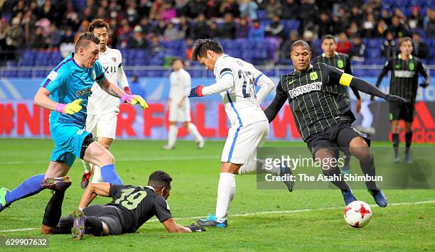 Yasushi Endo of Kashima Antlers scores his team's second goal during the FIFA Club World Cup Semi Final match between Atletico Nacional and Kashima...