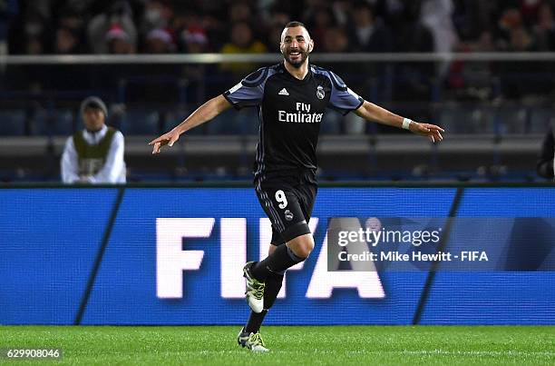 Karim Benzema of Real Madrid celebrates after scoring his sides first goal during the FIFA Club World Cup Semi Final match between Club America and...