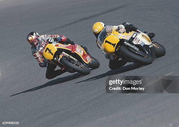 Barry Sheene of Great Britain rides the Yamaha YZR 500 alongside rival Kenny Roberts of the United States riding the Yamaha YZR 500 during the French...