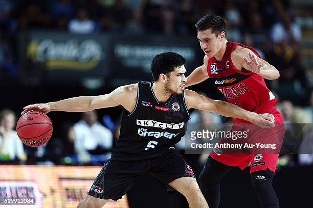 Shea Ili of the Breakers competes against Jarrod Kenny of the Wildcats during the round 11 NBL match between New Zealand Breakers and Perth Wildcats...