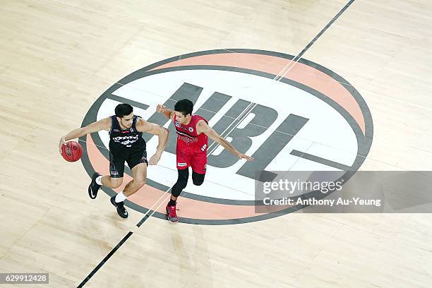 Shea Ili of the Breakers competes against Mason Bragg of the Wildcats during the round 11 NBL match between New Zealand Breakers and Perth Wildcats...