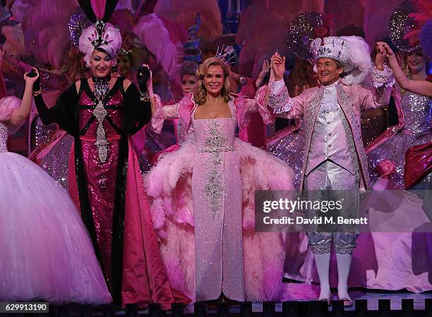 Paul O'Grady, Amanda Holden and Nigel Havers boy at the curtain call during the Opening Night performance of "Cinderella" at London Palladium on...