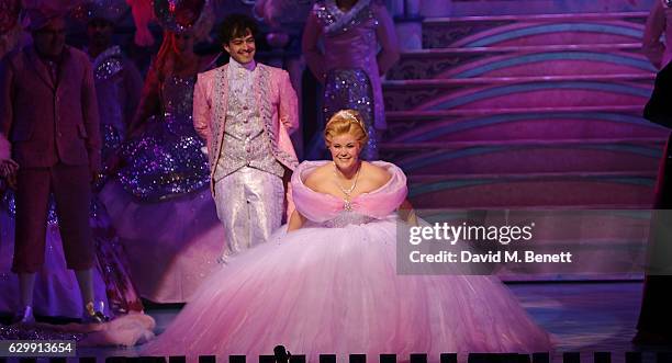 Lee Mead and Natasha J Barnes bow at the curtain call during the Opening Night performance of "Cinderella" at London Palladium on December 14, 2016...