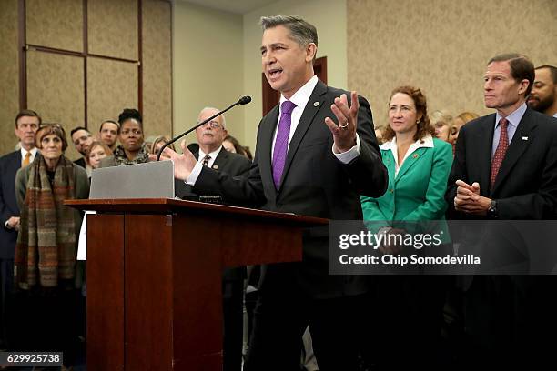 The Brady Campaign President Dan Gross speaks during a news conference with more than 80 family members and friends of people who were killed by gun...