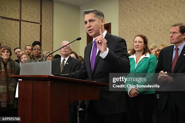 The Brady Campaign President Dan Gross speaks during a news conference with more than 80 family members and friends of people who were killed by gun...