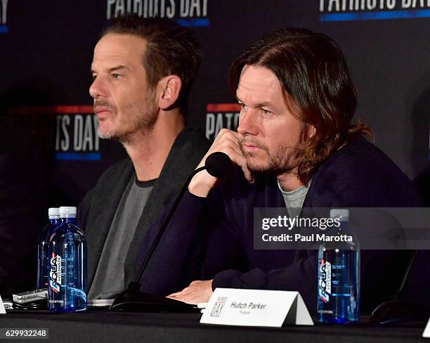 Peter Berg and Mark Wahlberg speak at a press conference to discuss the making of the feature film "Patriots Day" at InterContinental Boston on...