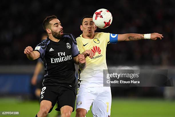 Daniel Carvajal of Real Madrid and Rubens Sambueza of Club America compete for the ball during the FIFA Club World Cup Semi Final match between Club...