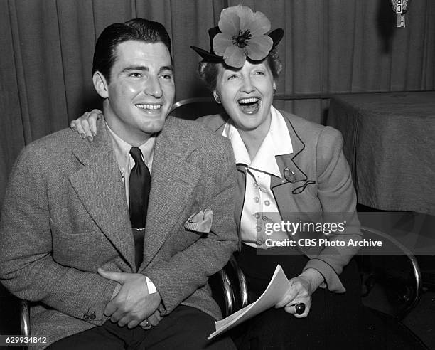 Radio personality and gossip columnist Hedda Hopper and son, William DeWolf Hopper, Jr. . Hollywood, CA. Image dated October 1, 1940.