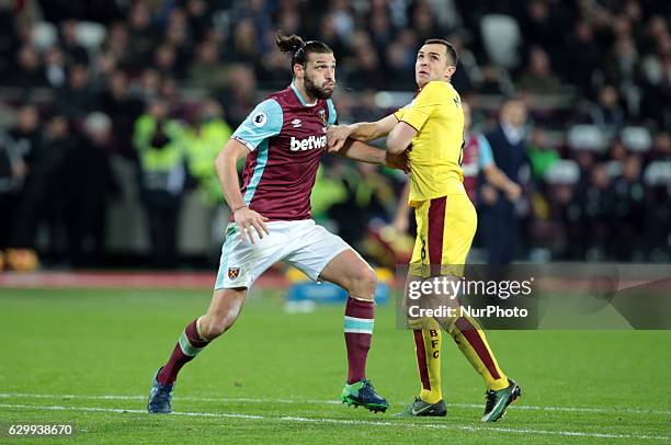 West Ham United's Andy Carroll and Burnley's Dean Marney during the Premier League match between West Ham United and Burnley at The London Stadium,...