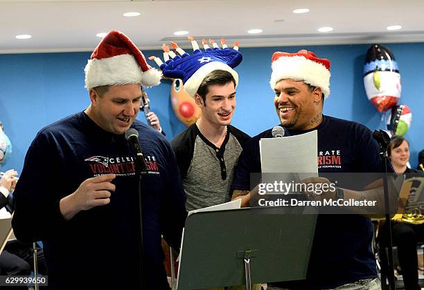 Former New England Patriots, Max Lane and Jermaine Wiggins read "Twas The Night Before Christmas" with Mason at Boston Children's Hospital December...