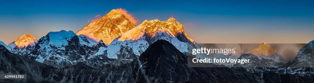 Golden sunset on Mt Everest summit Himalaya mountains peaks panorama