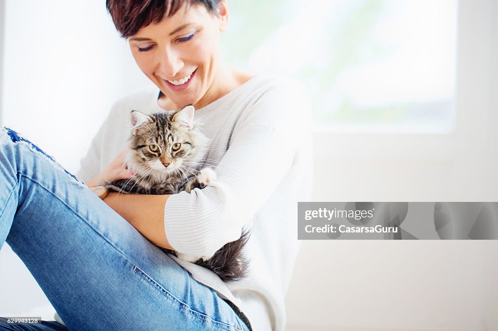 Happy Woman Portrait with her Cat