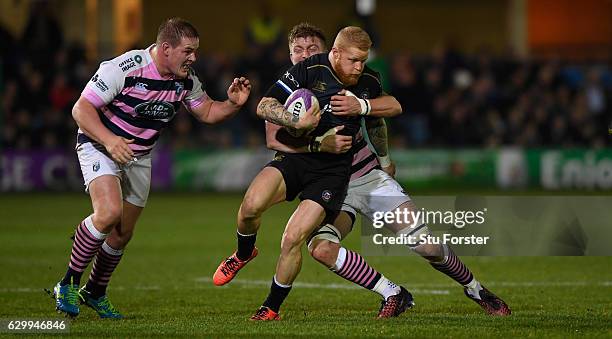 Tom Homer makes a break through the Blues defence during the European Rugby Challenge Cup match between Bath Rugby and Cardiff Blues at The...