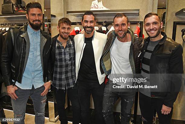 Olivier Giroud, Mathieu Debuchy, Robert Pires, Philipp Plein and Lucas Perez attend a cocktail party hosted by Philipp Plein to celebrate the opening...