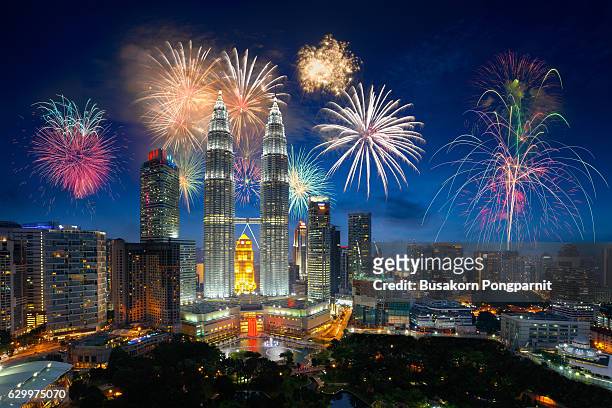 firework over kuala lumpur city, malaysia skyline - kuala lumpur stock pictures, royalty-free photos & images