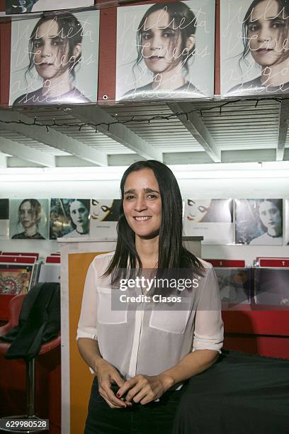 Mexican Singer Julieta Venegas signs autographs for fans during the promotion of his new album 'Vinil' at Roma Records store on December 14, 2016 in...