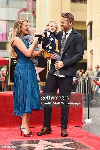 Actors Blake Lively and Ryan Reynolds pose with their daughters as Ryan Reynolds is honored with star on the Hollywood Walk of Fame on December 15,...