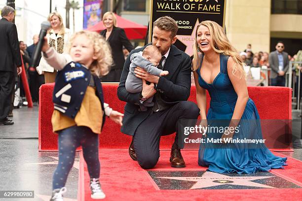 Actors Ryan Reynolds and Blake Lively pose with their daughters as Ryan Reynolds is honored with star on the Hollywood Walk of Fame on December 15,...