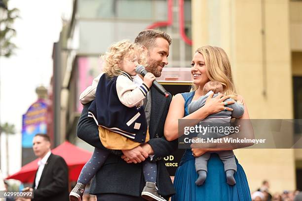 Actors Ryan Reynolds and Blake Lively pose with their daughters as Ryan Reynolds is honored with star on the Hollywood Walk of Fame on December 15,...