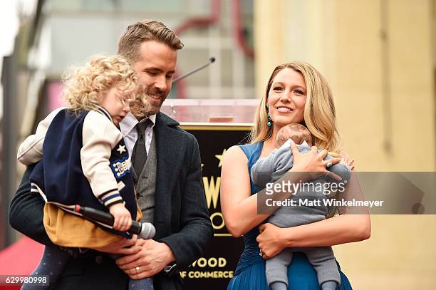 Actors Ryan Reynolds and Blake Lively pose with their daughters as Ryan Reynolds is honored with star on the Hollywood Walk of Fame on December 15,...