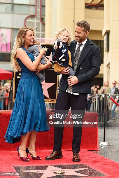 Actors Blake Lively and Ryan Reynolds pose with their daughters as Ryan Reynolds is honored with star on the Hollywood Walk of Fame on December 15,...