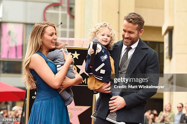 Actors Blake Lively and Ryan Reynolds pose with their daughters as Ryan Reynolds is honored with star on the Hollywood Walk of Fame on December 15,...