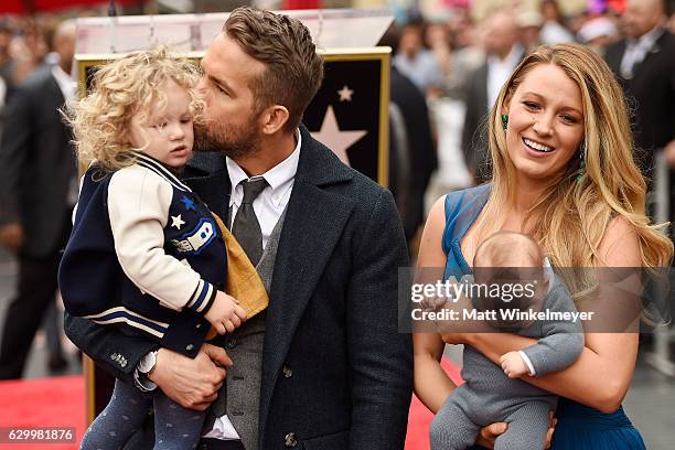 Actors Ryan Reynolds and Blake Lively pose with their daughters as Ryan Reynolds is honored with star on the Hollywood Walk of Fame on December 15,...