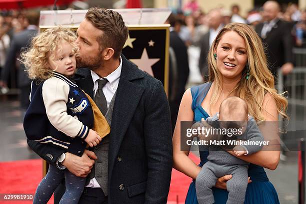 Actors Ryan Reynolds and Blake Lively pose with their daughters as Ryan Reynolds is honored with star on the Hollywood Walk of Fame on December 15,...